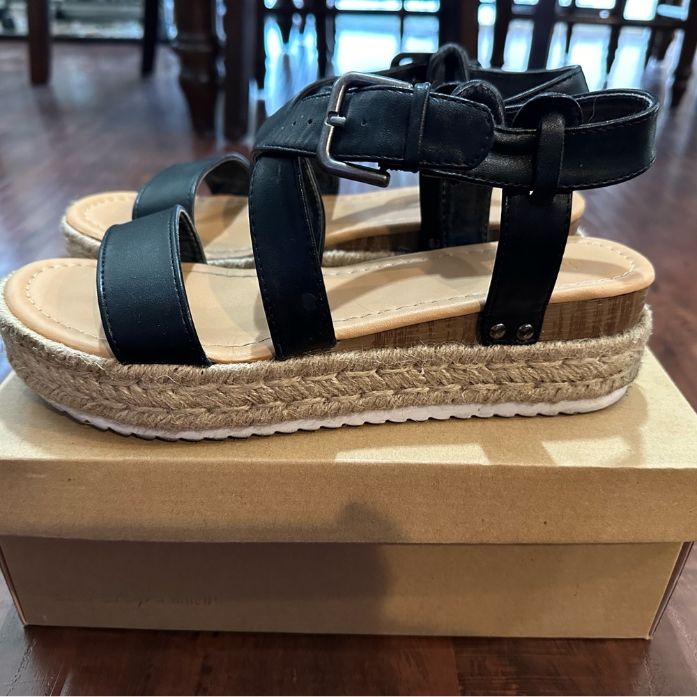 Black leather sandals